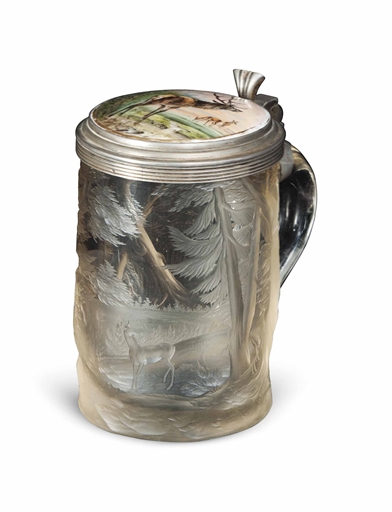 A BOHEMIAN ENGRAVED GLASS PEWTER AND METAL-MOUNTED TANKARD
CIRCA 1840, PROBABLY ENGRAVED BY AUGUST