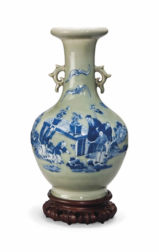 A CHINESE MOULDED BLUE AND WHITE CELADON-GROUND BALUSTER VASE
19TH CENTURY
With archaistic handles