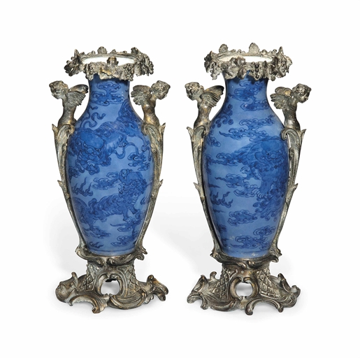 A PAIR OF CHINESE BLUE-GROUND VASES WITH EUROPEAN MOUNTS
19TH CENTURY
Each of ovoid form with