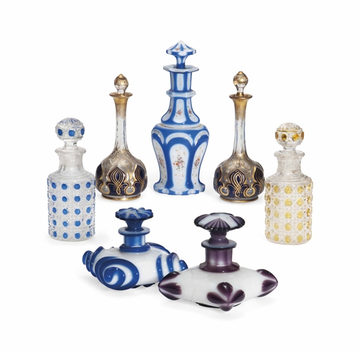 SEVEN BOHEMIAN CUT-GLASS SCENT-BOTTLES AND STOPPERS
LATE 19TH / EARLY 20TH CENTURY
Comprising: