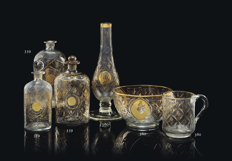 THREE BEYKOZ GILT CLEAR-GLASS CUT BOTTLES
OTTOMAN TURKEY, 19TH CENTURY
Each on plain base, with