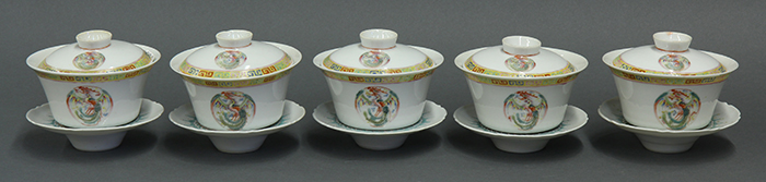 (lot of 5) Chinese enameled porcelain lidded cups and saucers, of inverted bell form with dragon