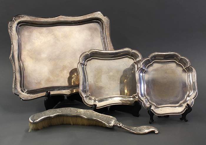 (lot of 4) Three Dutch .833 silver trays, each shaped and polished surface with decorated corners
