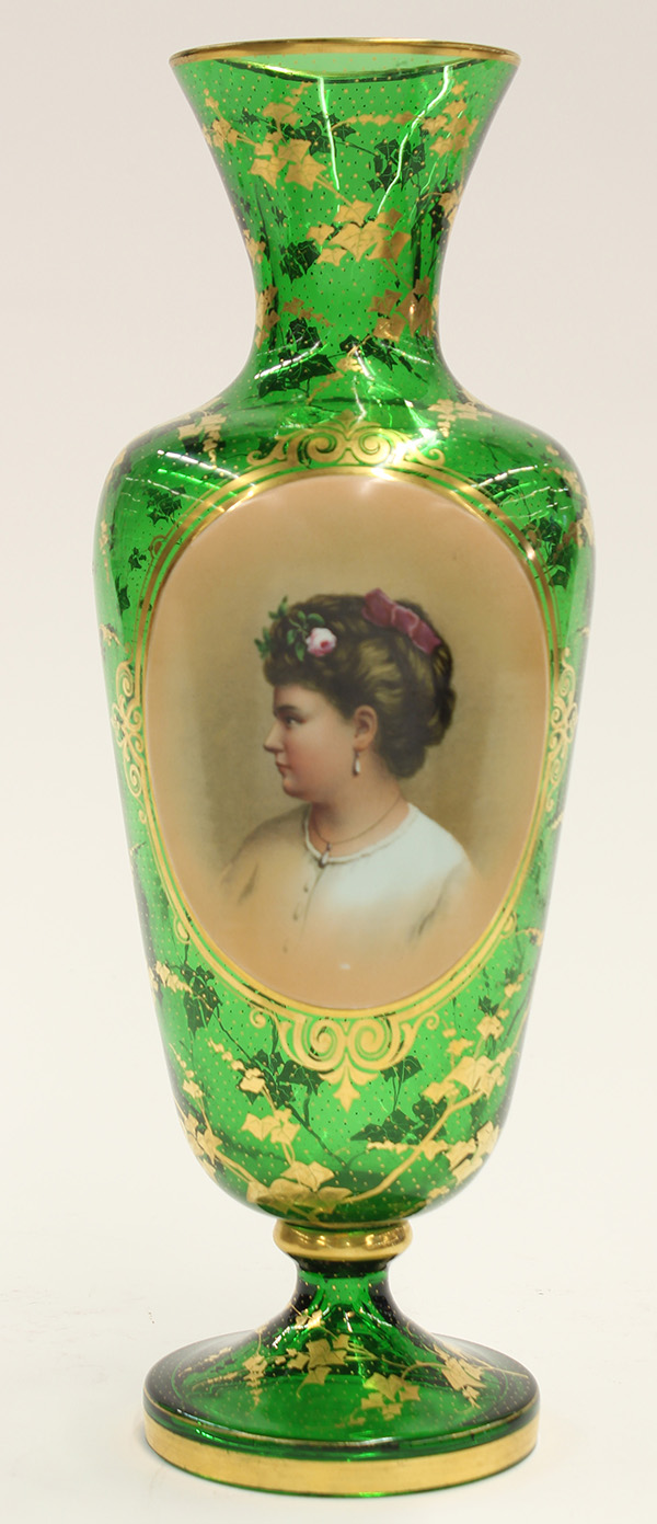 Bohemian portrait vase, the tapered form executed in green glass, having gilt floral sprays