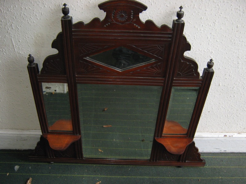 An Edwardian mahogany over-mantle mirror of small proportions