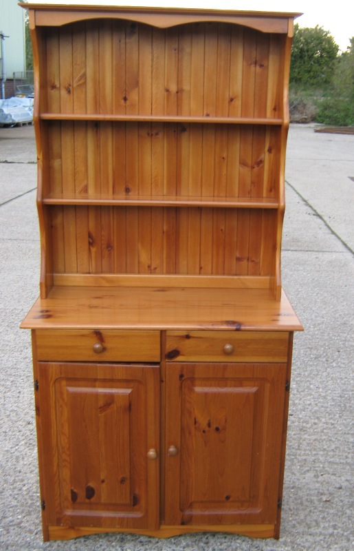 A modern pine dresser of small proportions