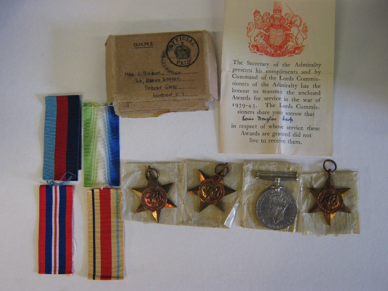 Set of 4 WWII Naval medals with letter of sorrow in named box