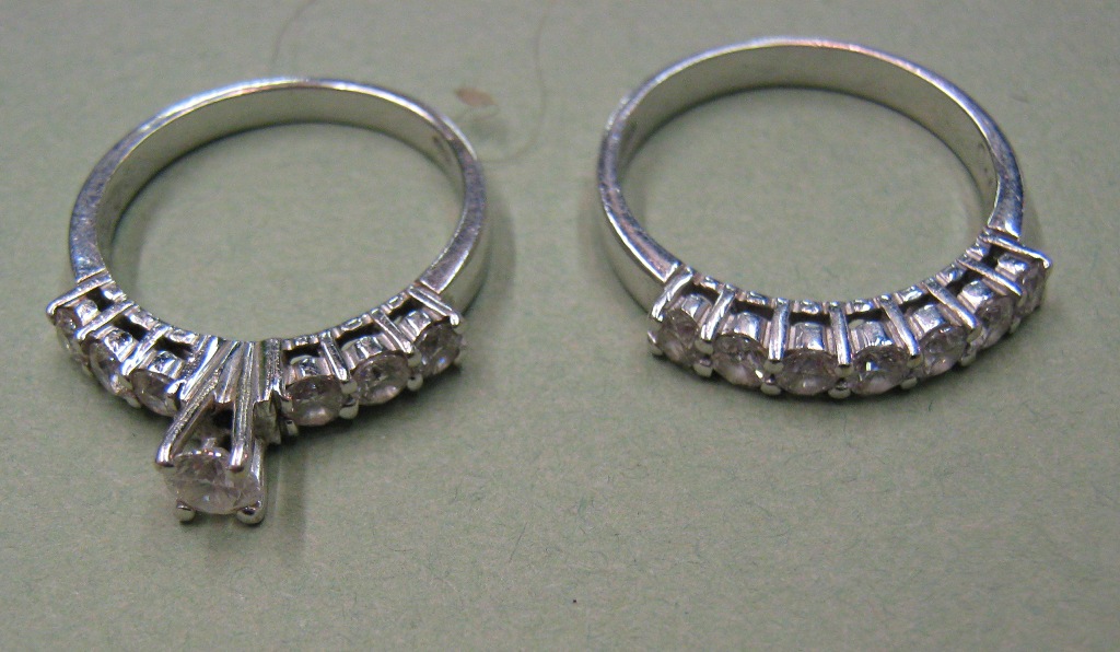 A pair of white gold and diamond set rings