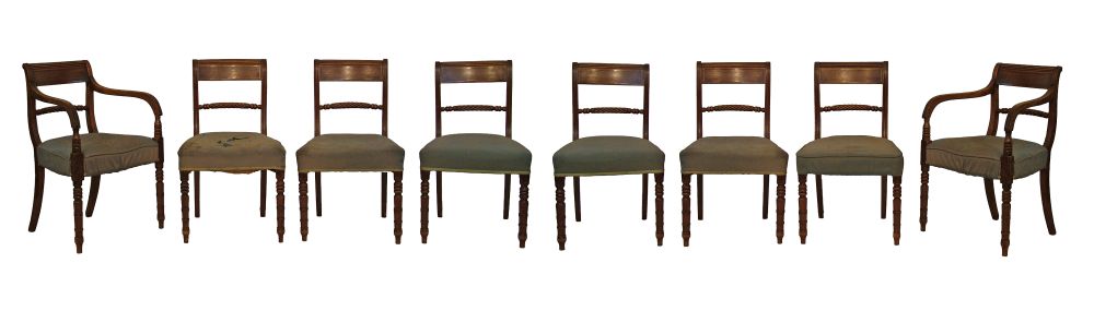 Set of eight Regency mahogany dining chairs, each having a rope twist bar back, brass stringing,