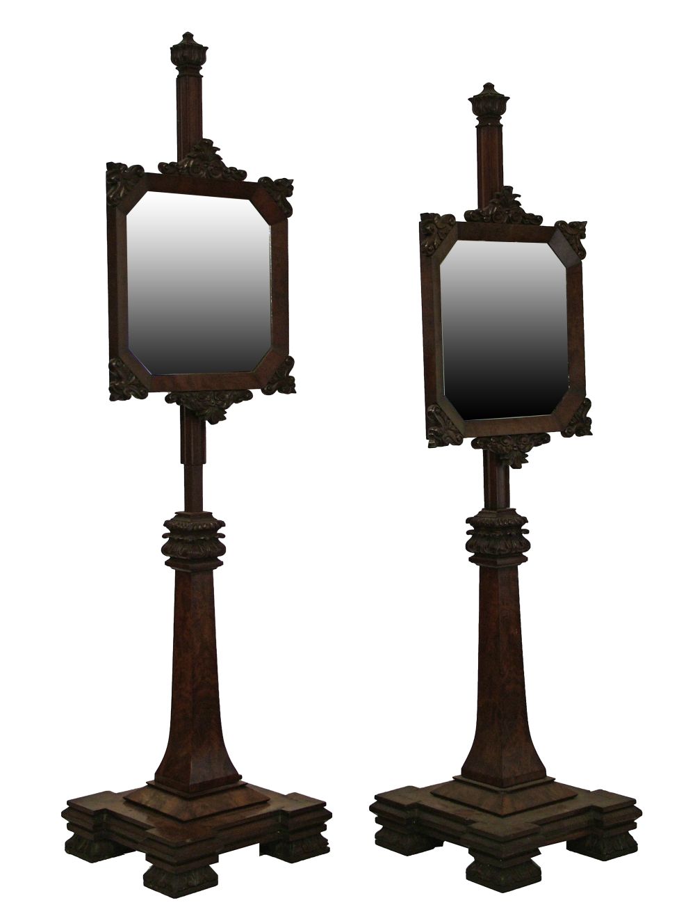 Pair of good quality William IV carved mahogany pole screens, each having a square mirrored panel