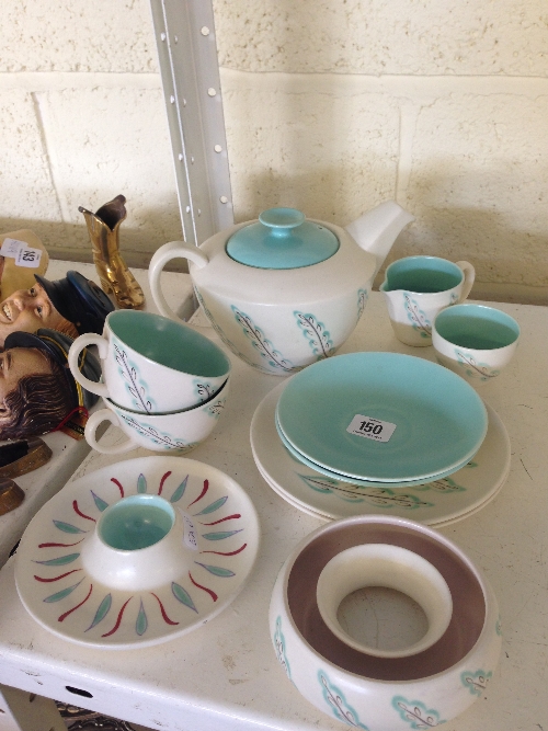 An Early Morning Poole Pottery tea service decorated in the NN pattern together with a Freeform