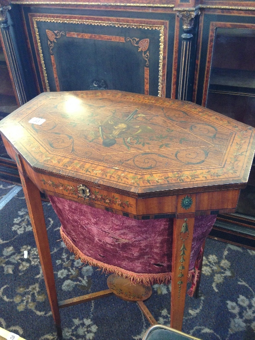 A 19th century fruit wood sewing table, the lid decorated with Hunting motifs with silk lined fabric