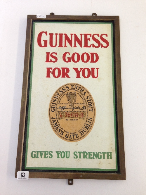 An early 20th century brass framed enamel Guinness advertising sign: 'Guinness is good for you,