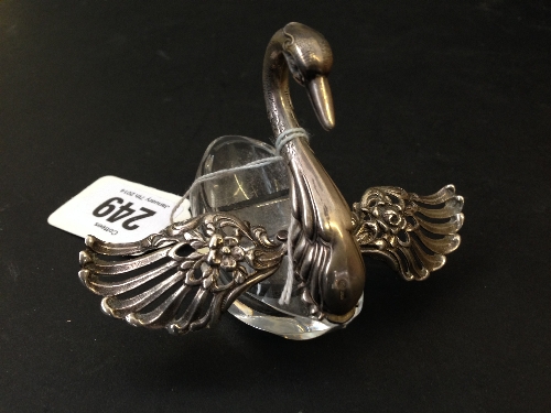 A small glass swan shaped pin tray with .835 silver mounts.