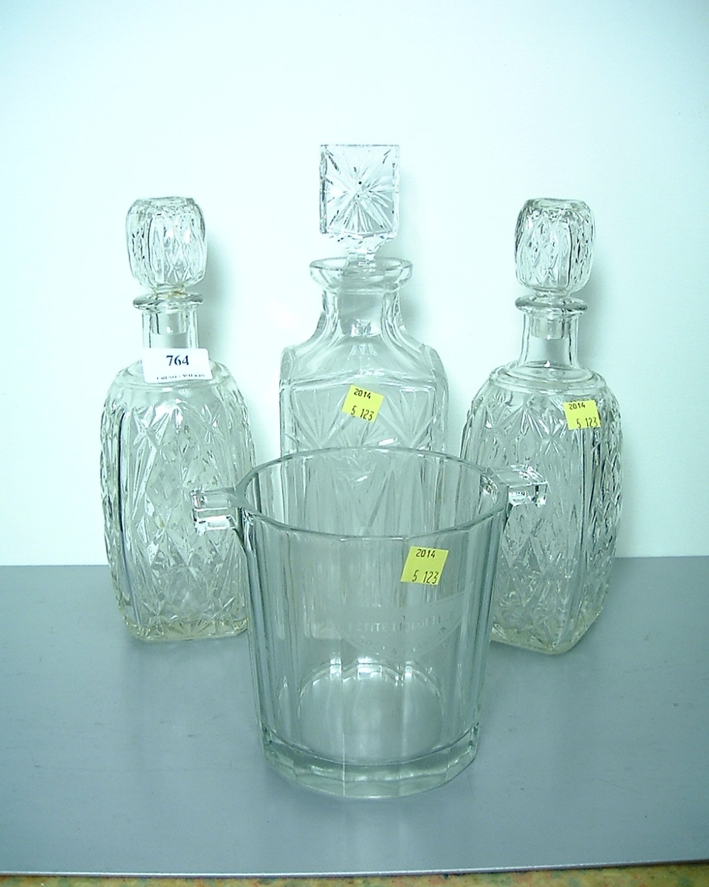THREE GLASS DECANTERS AND GLASS JUG