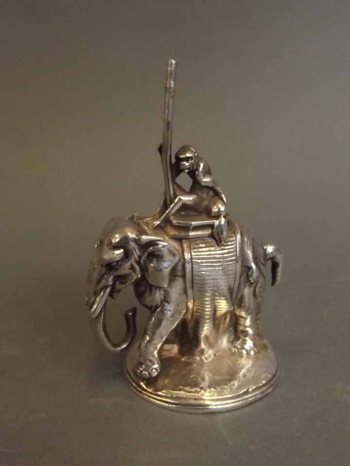 A Christofle silver plated Indian elephant carrying a monkey, 3¾" high