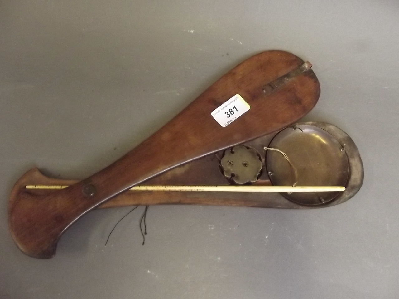 A set of C19th Chinese brass and ivory scales in a wood case 13½" x 3½"