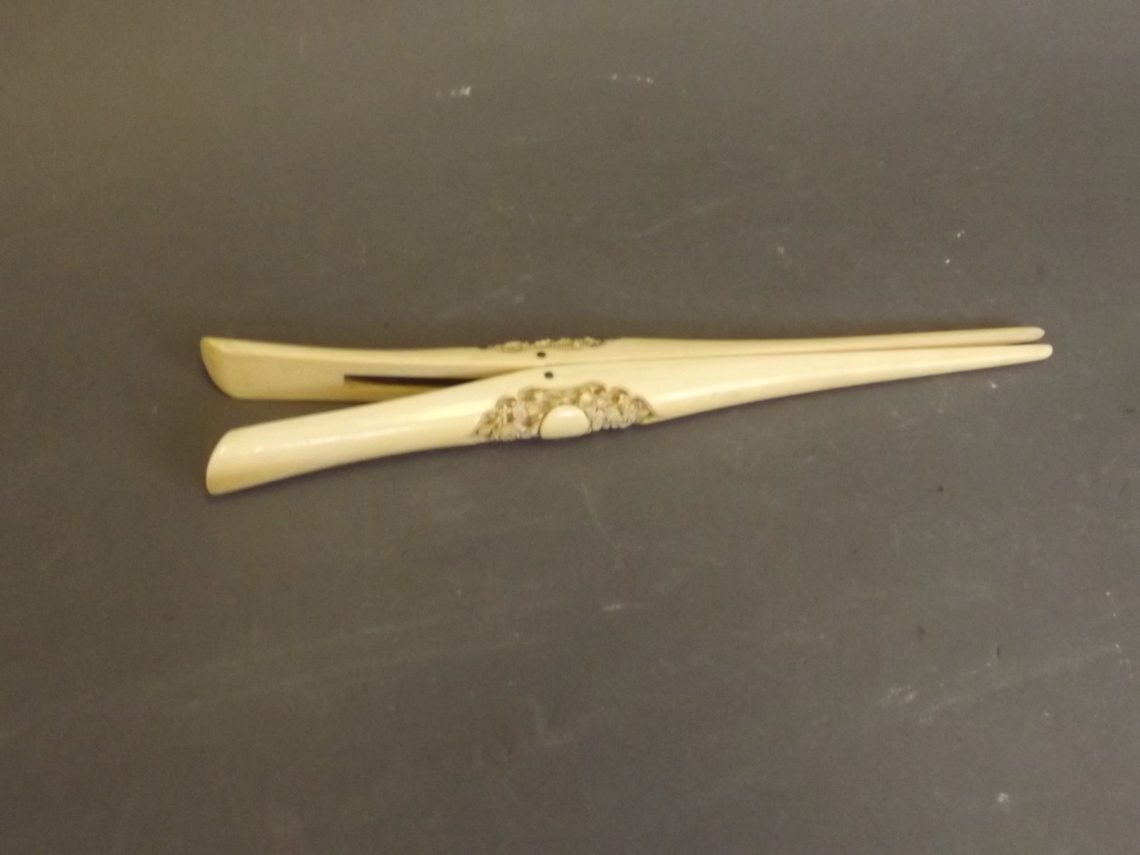 A pair of C19th Cantonese carved ivory glove stretchers, 8½" long