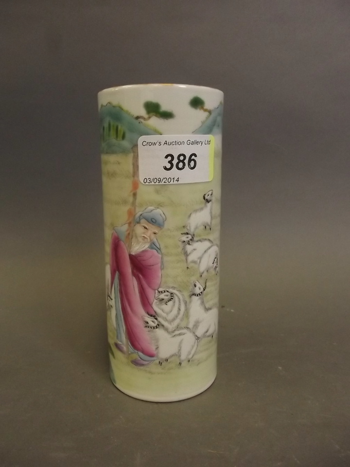 A Chinese pottery cylindrical brush pot painted in enamels 6" high