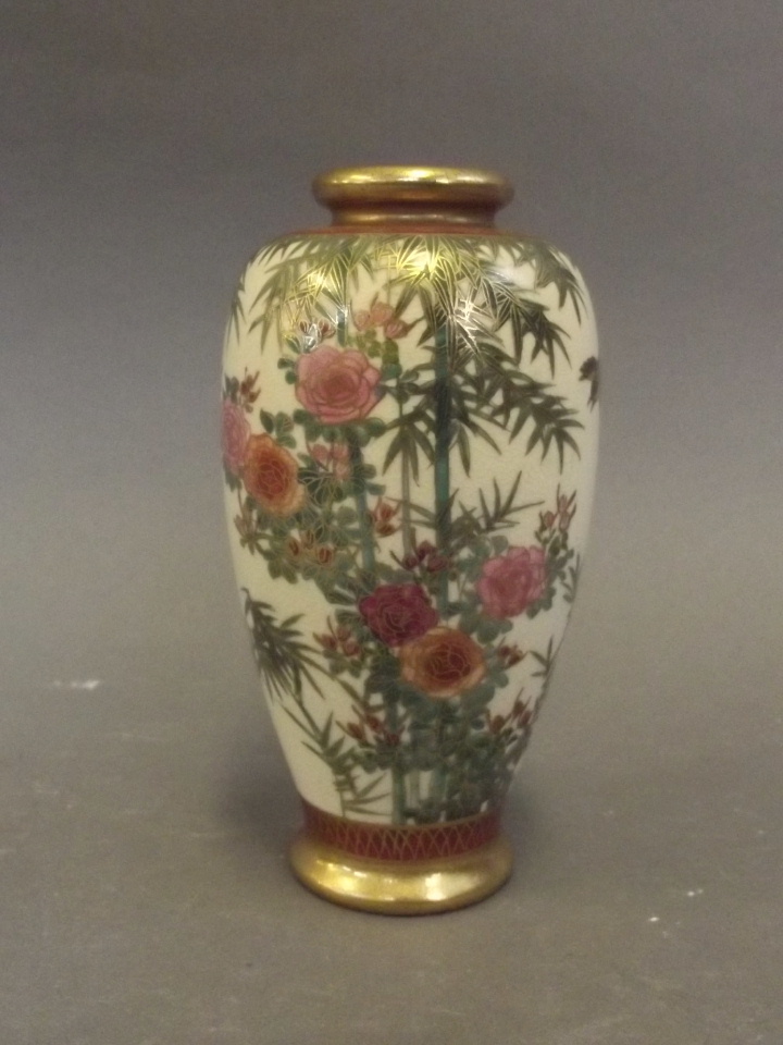An early C20th Japanese Satsuma vase painted with flowers, signed to base, 5" high