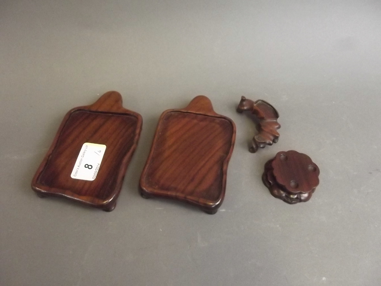 A pair of Chinese hardwood stands 5" x 3", and two smaller stands