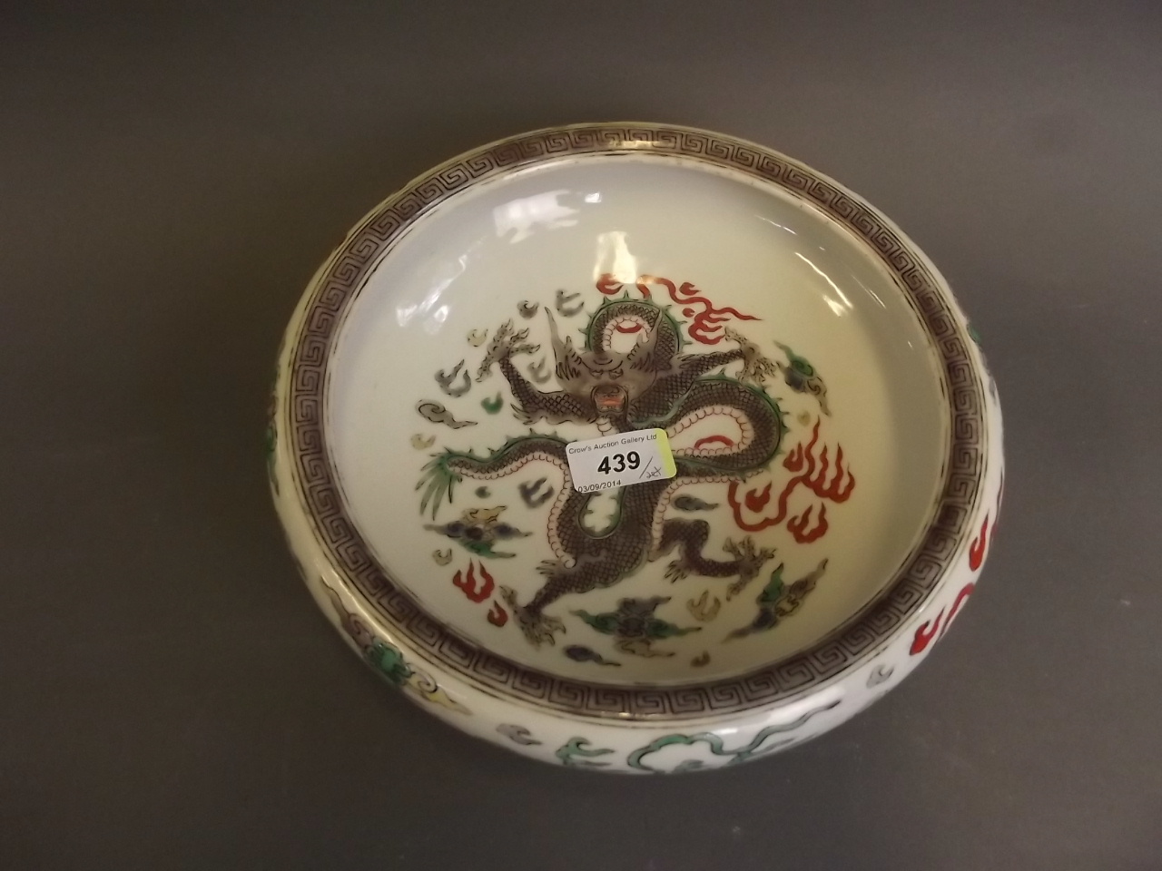 A late C19th/early C20th Chinese bowl with famille verte dragon and flaming pearl decoration, 4