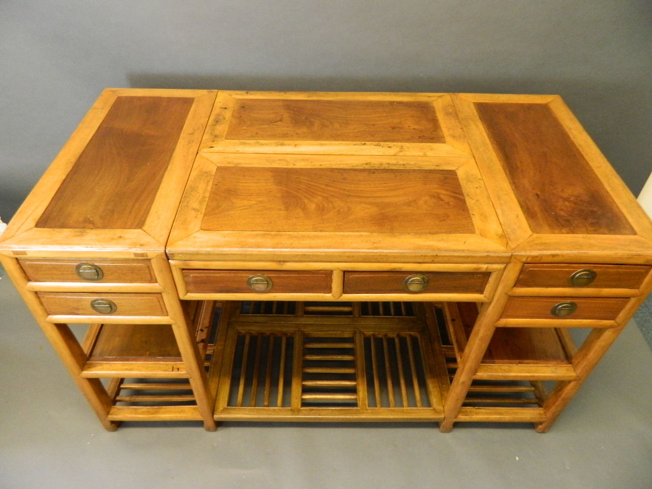 A good Chinese fruitwood twelve drawer partners desk, with hardwood inset panels, first half of