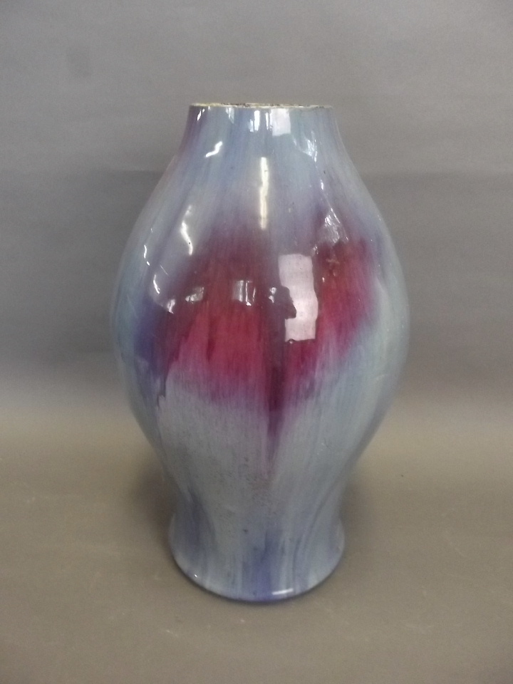 A large antique Chinese pottery vase with a blue and purple high fired glaze, reduced in height, 17"