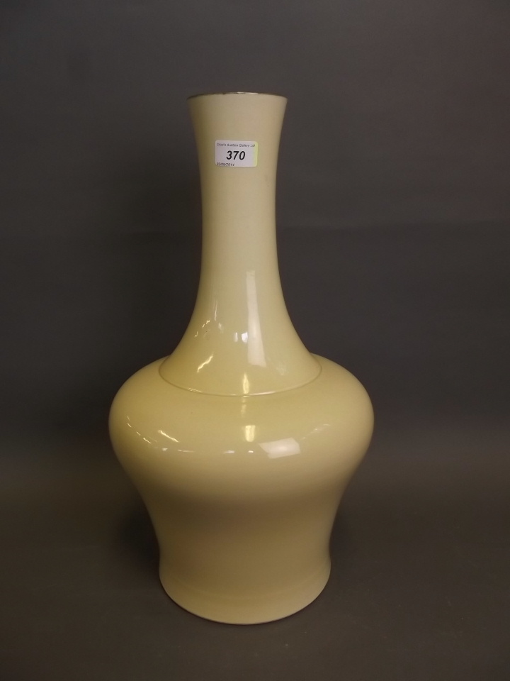 A large Oriental cream glaze fine potted pottery vase, marked to base 19½" high