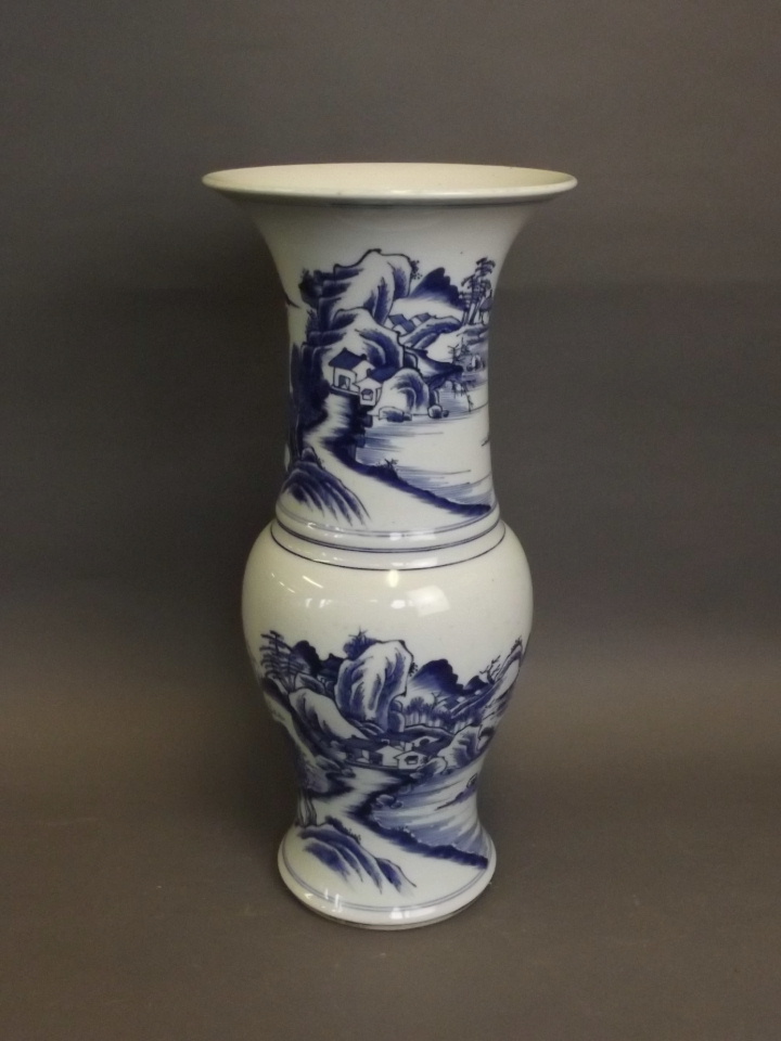 A large C18th Chinese blue and white porcelain vase with painted decoration of a lakeside village