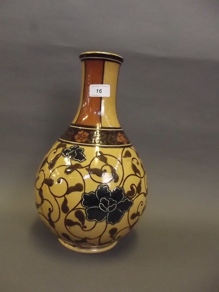 A good large C19th Wedgwood pottery vase painted with Persian style stylised flowers, impressed