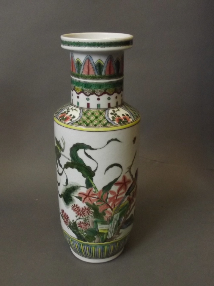 A Chinese famille verte vase with painted enamel decoration of finches and grasshoppers amongst