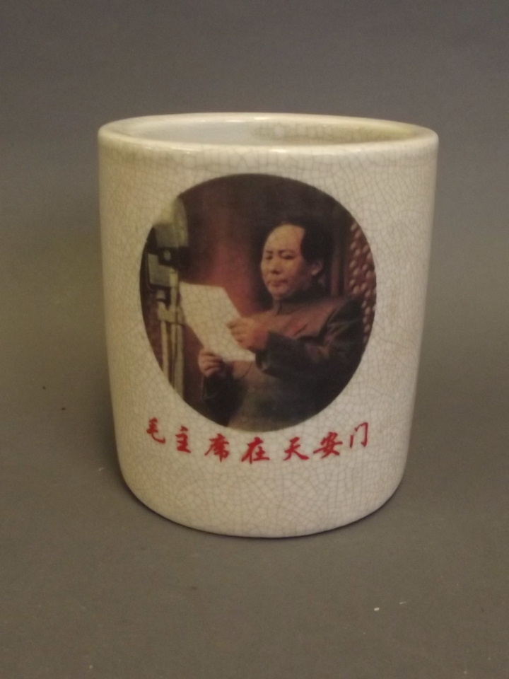 A Chinese crackleware brushpot with applied decoration of Chairman Mao, inscription verso, 6