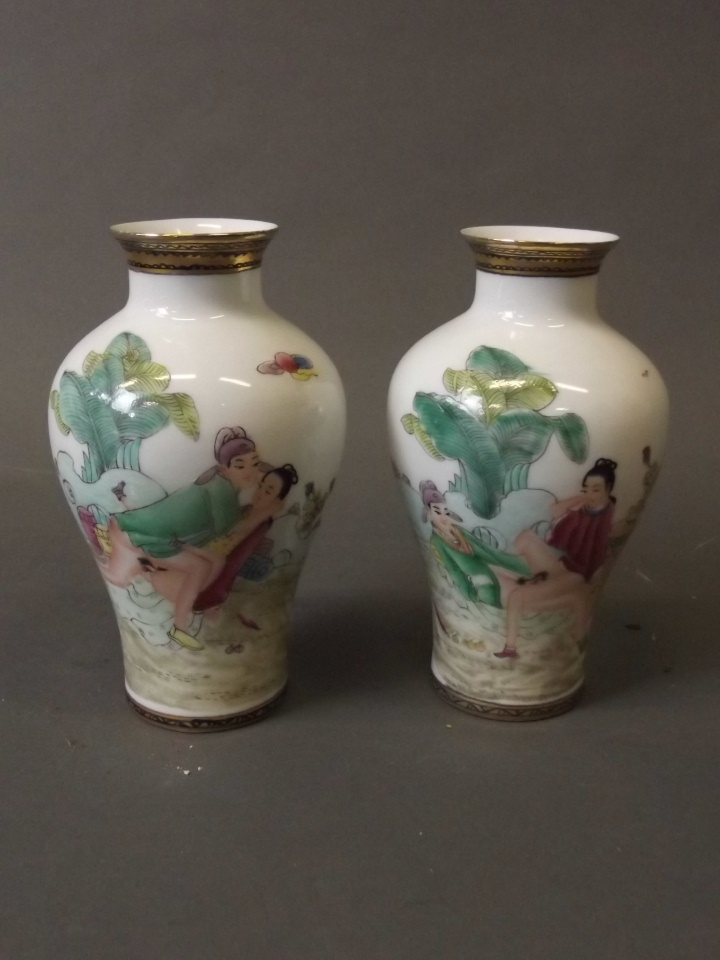 A pair of Chinese fine porcelain vases with enamel decoration depicting erotic scenes and