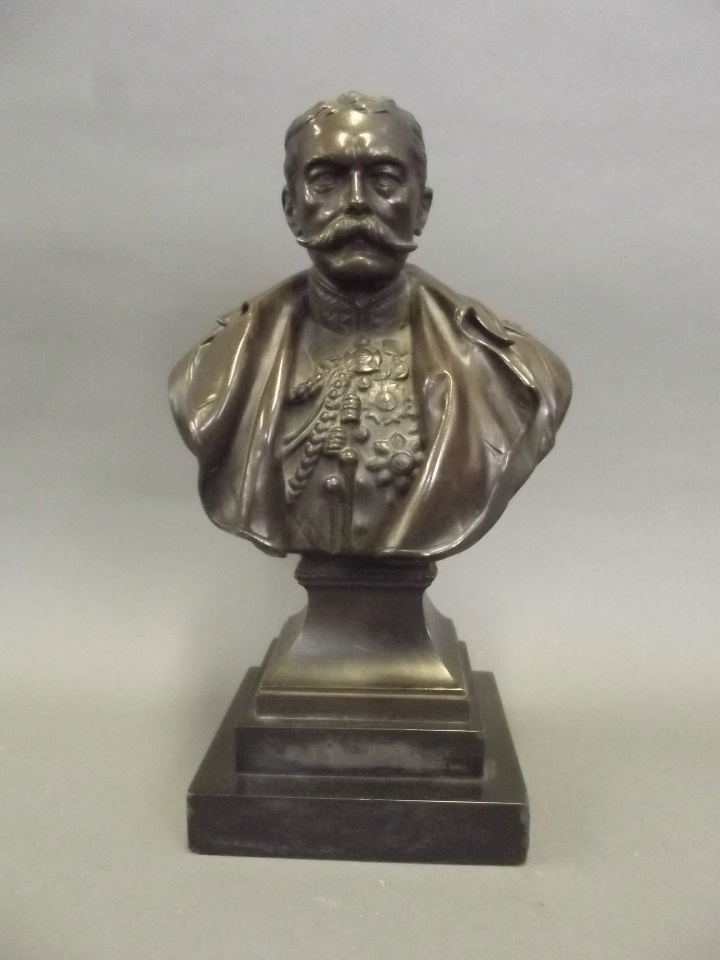 An early C20th bronze bust of Lord Kitchener by Richard Claude Belt, signed and dated 1916, 10½''