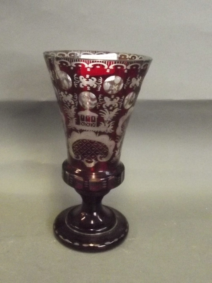 A C19th Bohemian ruby glass goblet with engraved decoration, 7¼'' high (AF)