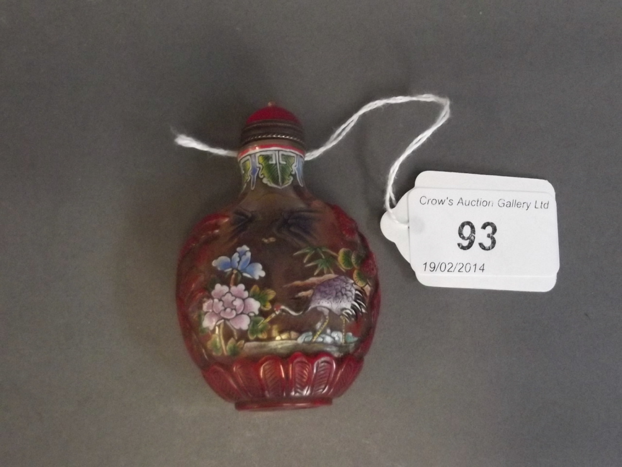 A Chinese Peking glass snuff bottle with enamelled decoration of wading storks, 2¾'' high