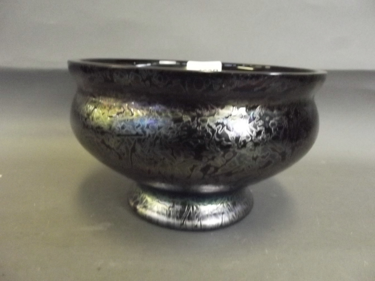 A Brieley blue Art Glass bowl with iridescent patterns, 8'' diameter