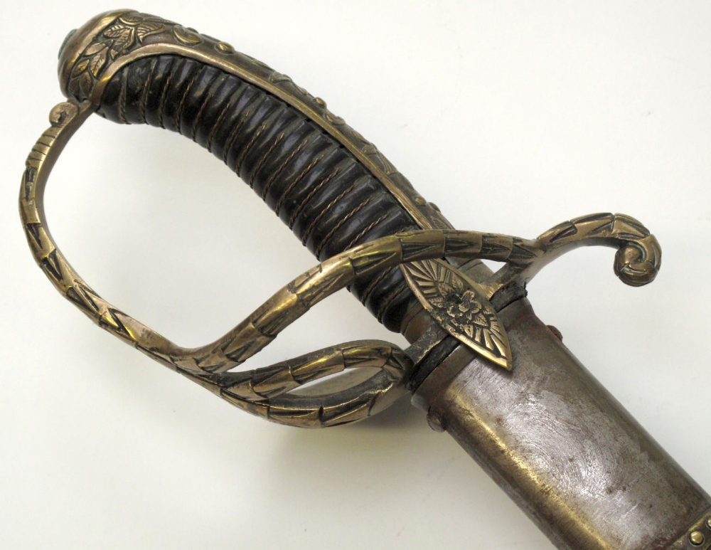 French Gendarmerie Royale Sword with brass two bar and dish back hilt. Decorated floral back strap.