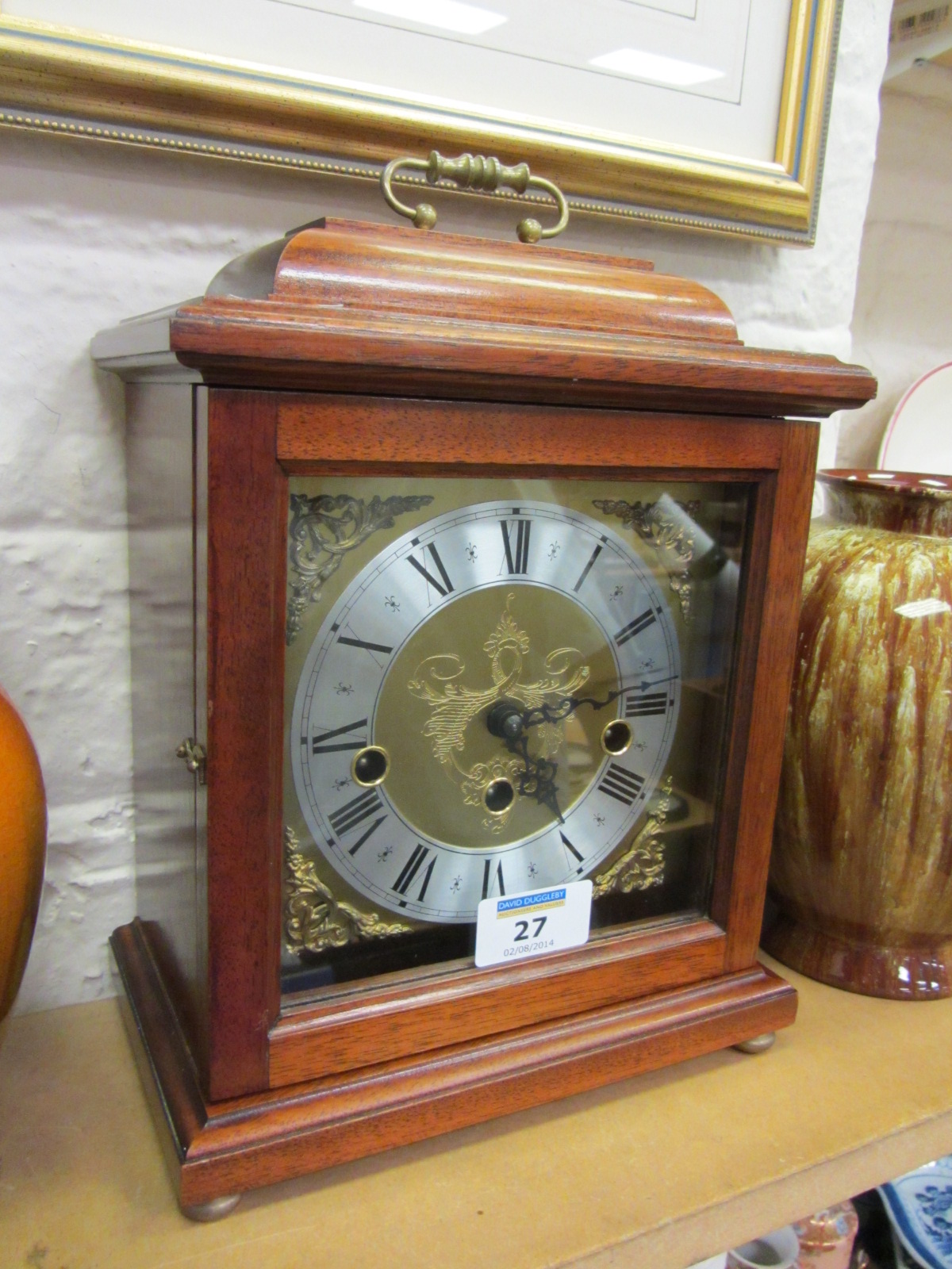Mahogany cased mantle clock with Frandz Hermle chiming movement, 28cm