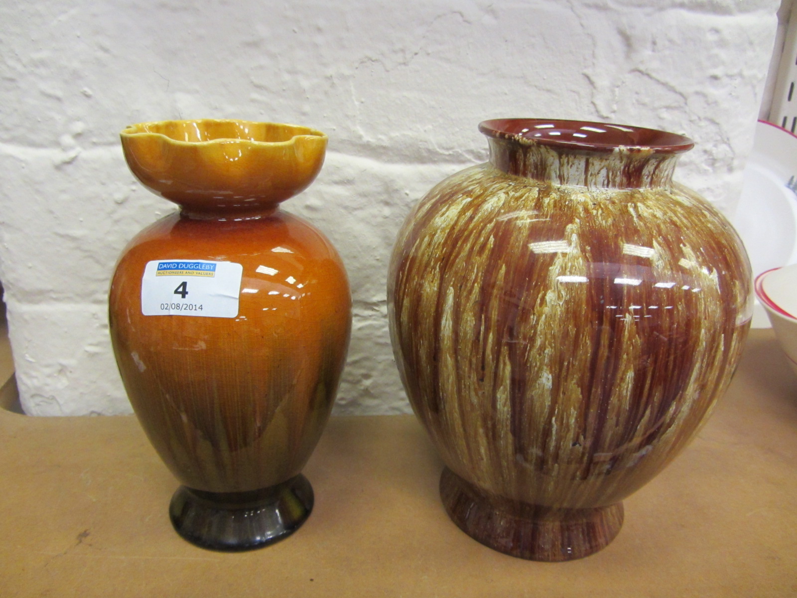 Linthorpe pottery amber glazed vase with folded rim impressed no. 2221, 18cm and another Linthorpe