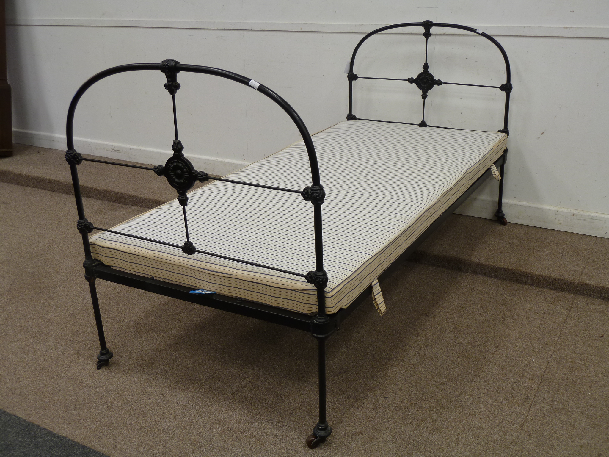 Victorian cast iron black painted single bedstead with box base