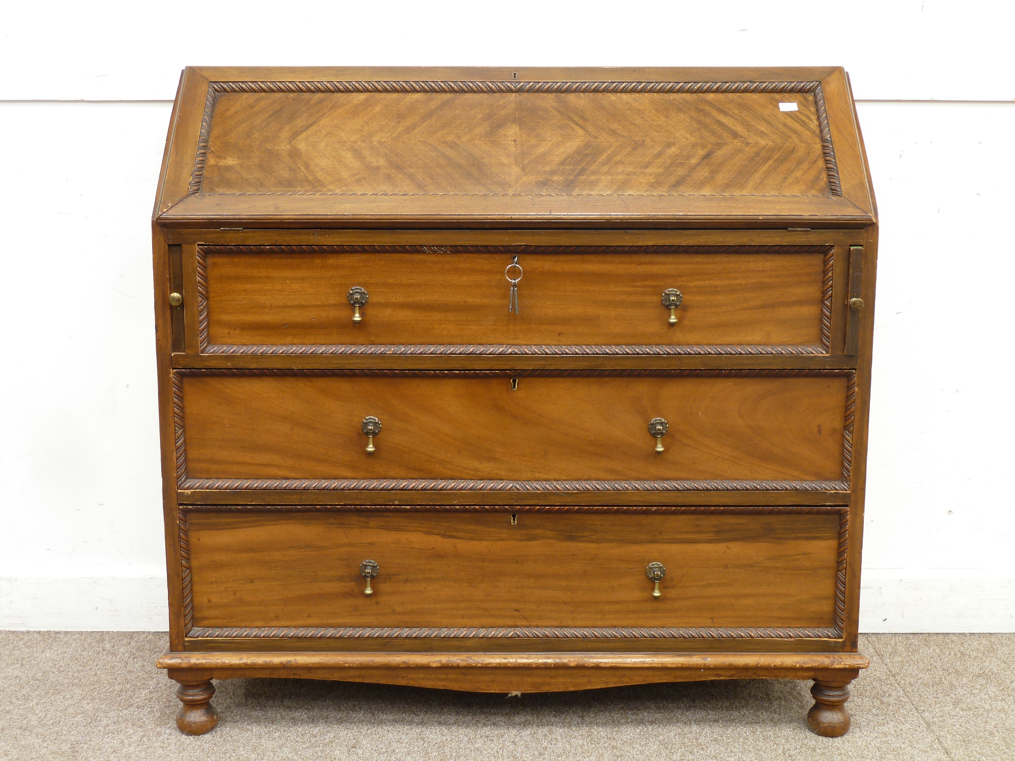 Early 20th mahogany three drawer bureau, L105cm