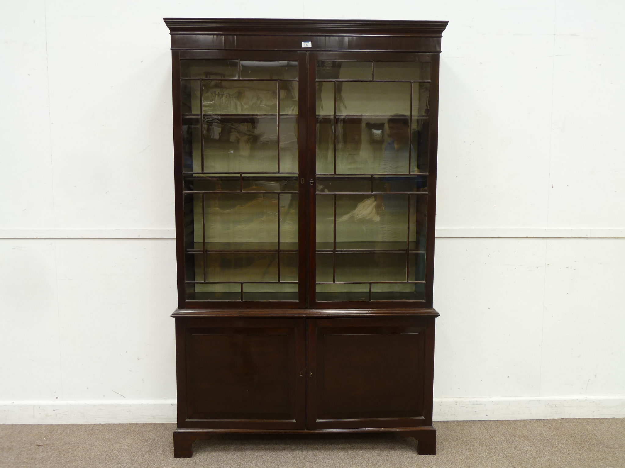 19th century mahogany bookcase on cupboard, two astragal glazed doors above two cupboards, W118cm