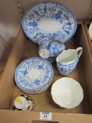 An early 20th century Royal Crown Derby blue and white part tea service decorated with birds in