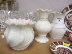 Three Belleek vases with pink decoration with brown and blue backstamps H16cm diminishing