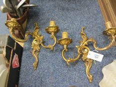 Pair of French gilt brass rococo style two branch wall lights