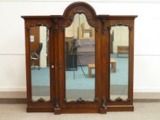 Victorian mahogany breakfront triple wardrobe, arch top centre section fitted with six drawers