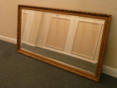Large gilt framed bevel edged wall mirror, 71cm x 133cm