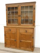 Gnomeman adzed oak two drawer dresser with lead glassed display doors, by Thomas Whittaker of Little